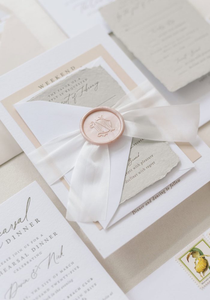 ringling museum wedding invitation with custom monogram wax seal and silk ribbon